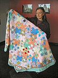 Anne_holds_quilt_prize.jpg